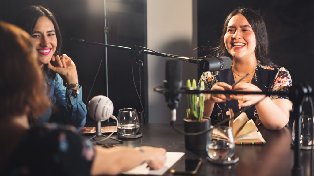 group of ladies recording a podcast