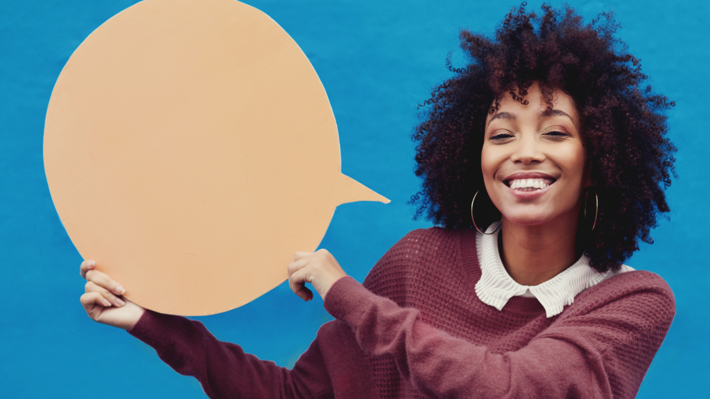 woman holding caption bubble